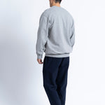 Pantalón LOREAK MENDIAN Train C Navy, vista de espalda en modelo