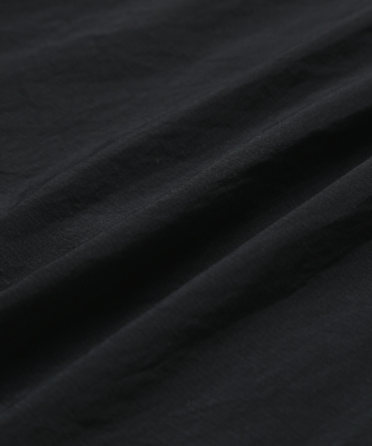 Chaqueta AND WANDER PERTEX Wind Jacket Black - vista oficial