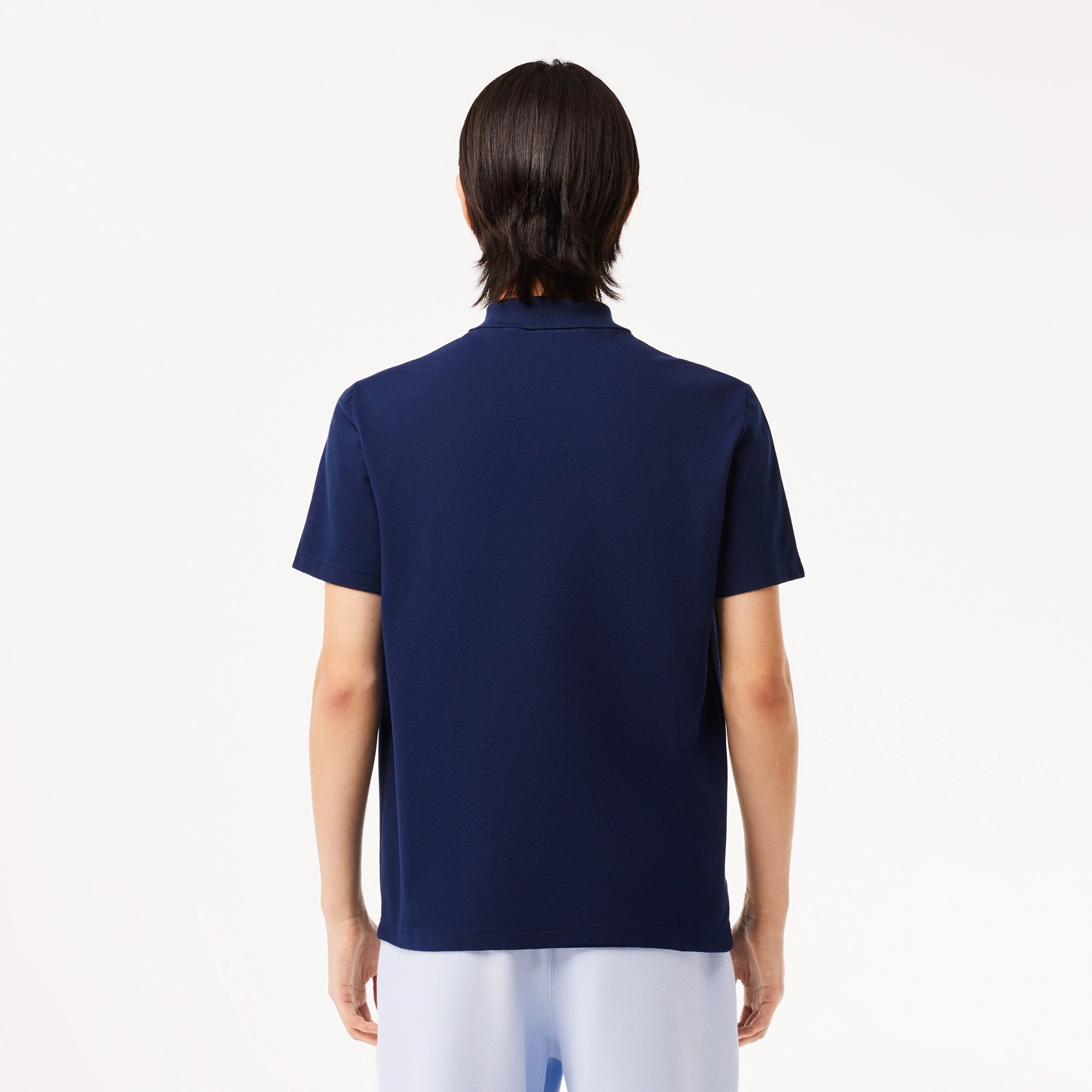 Lacoste Herren-Poloshirt mit normaler Passform aus ökologischer Stretch-Baumwolle in Marineblau 