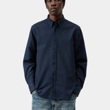 Camisa CARHARTT WIP L/S Bolton Dark Navy, vista frontal con modelo