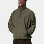 Sudadera CARHARTT WIP Edmore Half Zip Cypress / Black, vista frontal con modelo