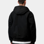 Chaqueta CARHARTT WIP OG Active Black Rigid, vista trasera con modelo