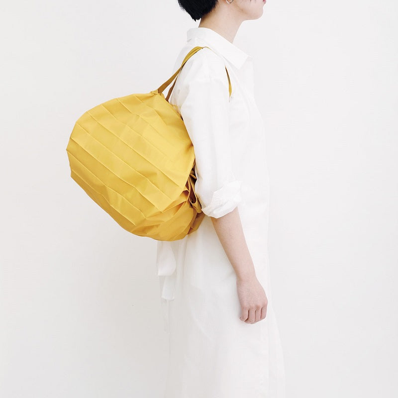 Bolsa SHUPATTO Compact M 15 L Mustard