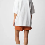 BLUE BANANA – Weißes T-Shirt mit Herztasche 