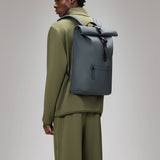 RAINS Rolltop Rucksack Schwarzer Rucksack
