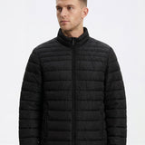 Chaqueta acolchada TIFFOSI Paradise negra — detalle frontal con modelo