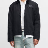 Chaqueta DEUS EX MACHINA Address Workwear negra — frontal con modelo