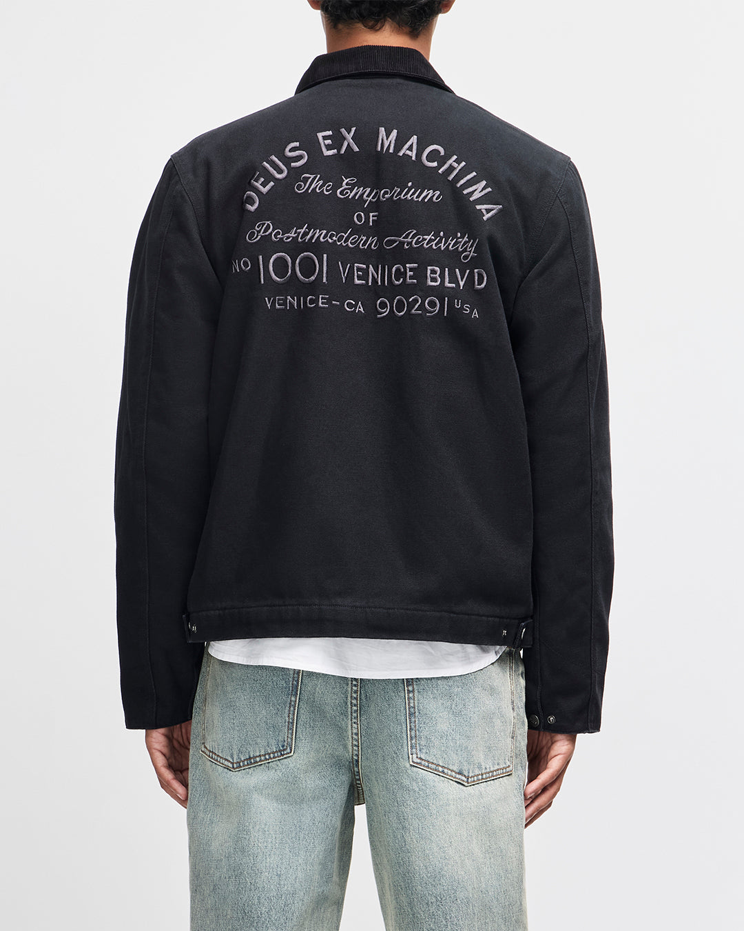 Chaqueta DEUS EX MACHINA Address Workwear negra — espalda con modelo