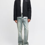 Chaqueta DEUS EX MACHINA Address Workwear negra — vista completa con modelo