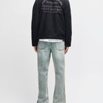 Chaqueta DEUS EX MACHINA Address Workwear negra — vista posterior con modelo