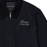 Chaqueta DEUS EX MACHINA Address Workwear negra — detalle del cuello y bordado frontal