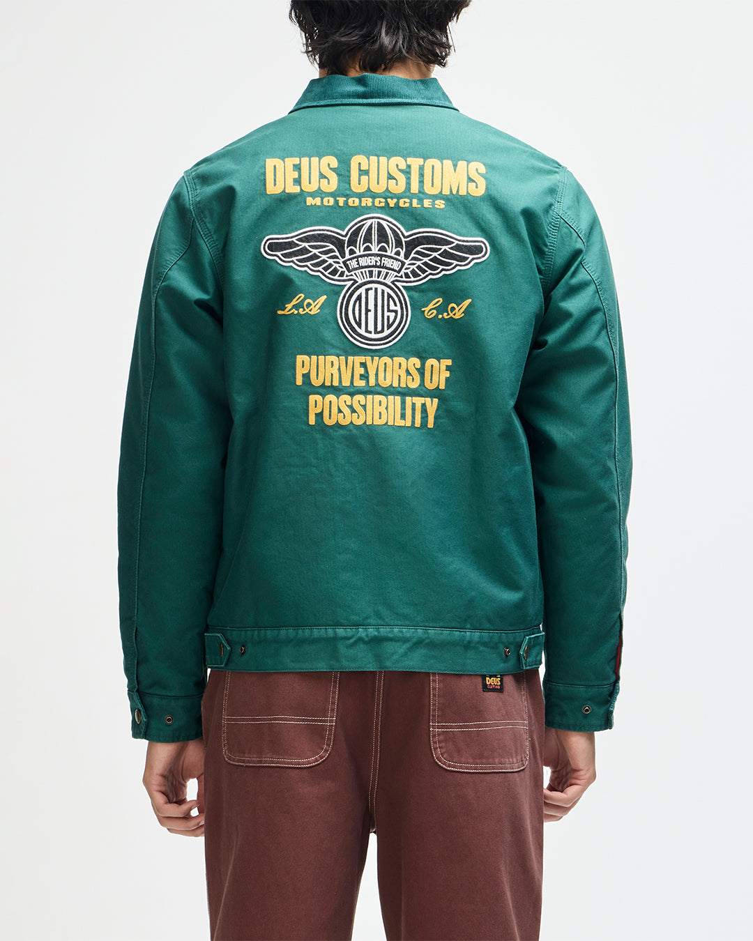 Chaqueta DEUS EX MACHINA Cutaway Racing Green — espalda con modelo