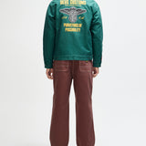 Chaqueta DEUS EX MACHINA Cutaway Racing Green — vista posterior completa con modelo
