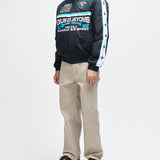 Chaqueta DEUS EX MACHINA Trife Life negra — vista lateral con modelo