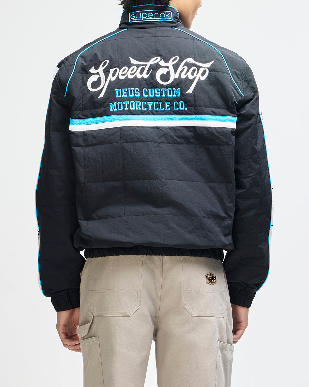 Chaqueta DEUS EX MACHINA Trife Life negra — espalda con modelo
