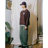 Sudadera KAPPY Pitch Fluff Sweatshirt Brown, vista lateral sobre modelo