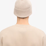 Unisex-Mütze aus recycelter Merinowolle in verblasstem Rosa