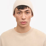 Unisex-Mütze aus recycelter Merinowolle in verblasstem Rosa