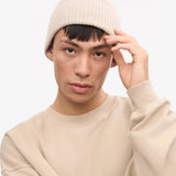 Unisex-Mütze aus recycelter Merinowolle in verblasstem Rosa