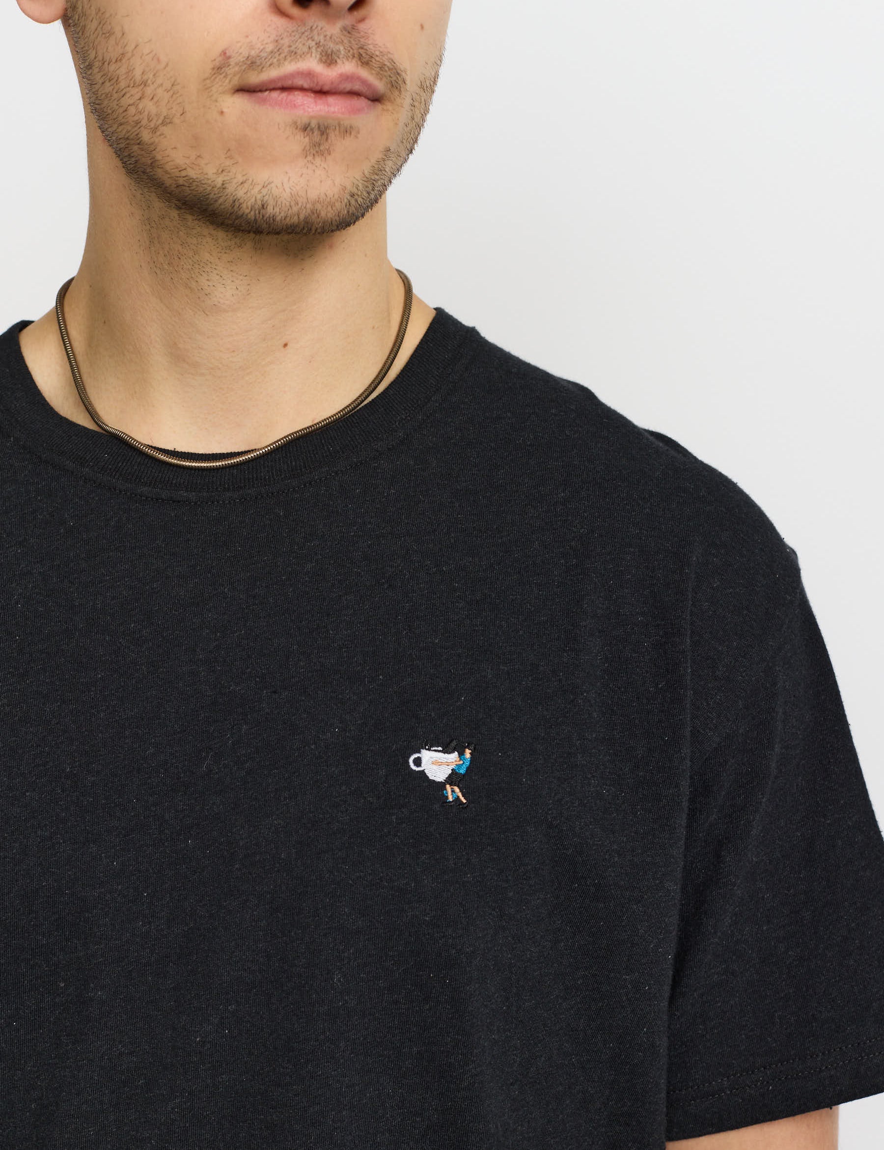 Camiseta REVOLUTION Application CAR Negro Jaspeado, modelo pecho