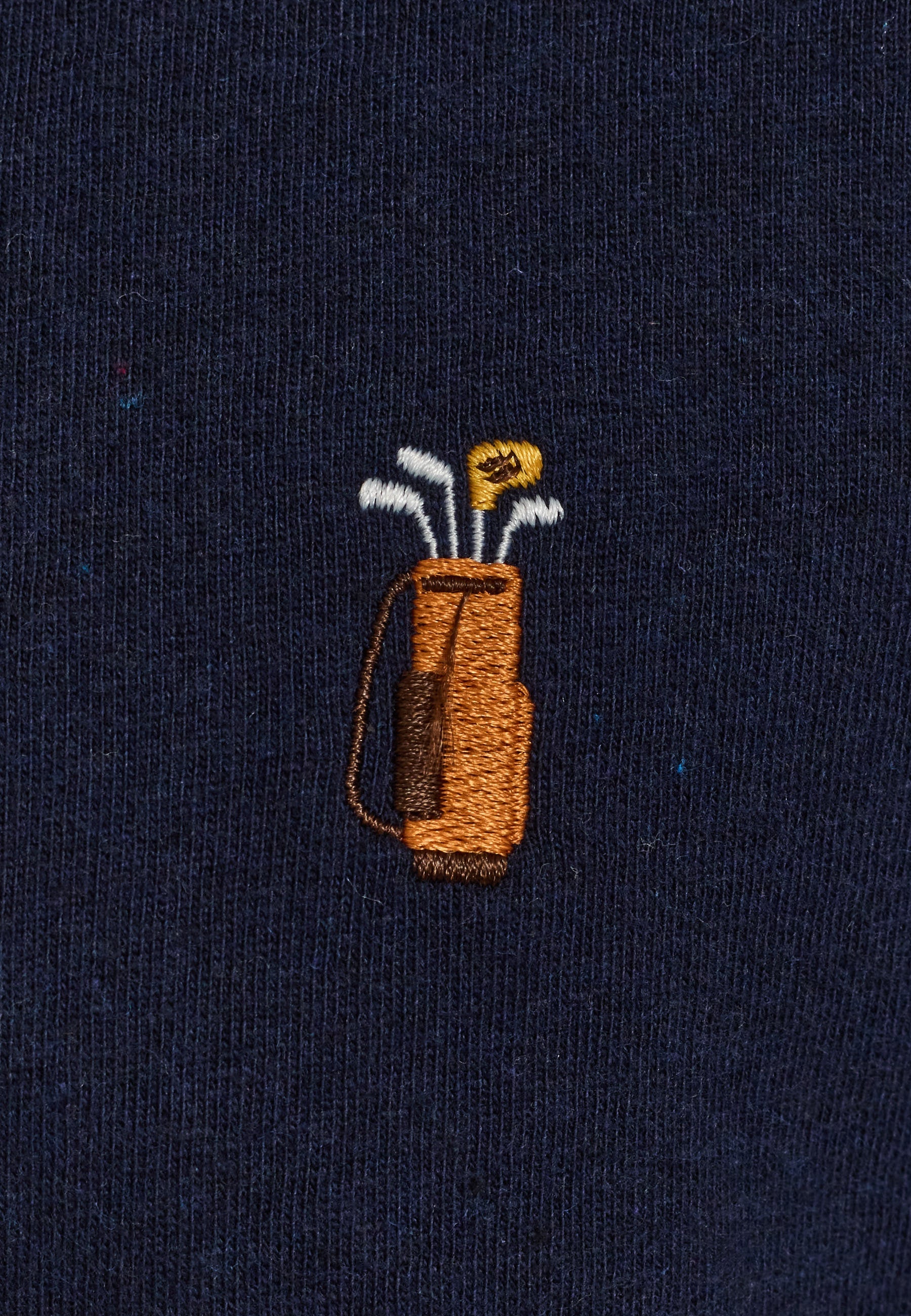 Camiseta REVOLUTION Application Golf Azul Marino Jaspeado, detalle bordado