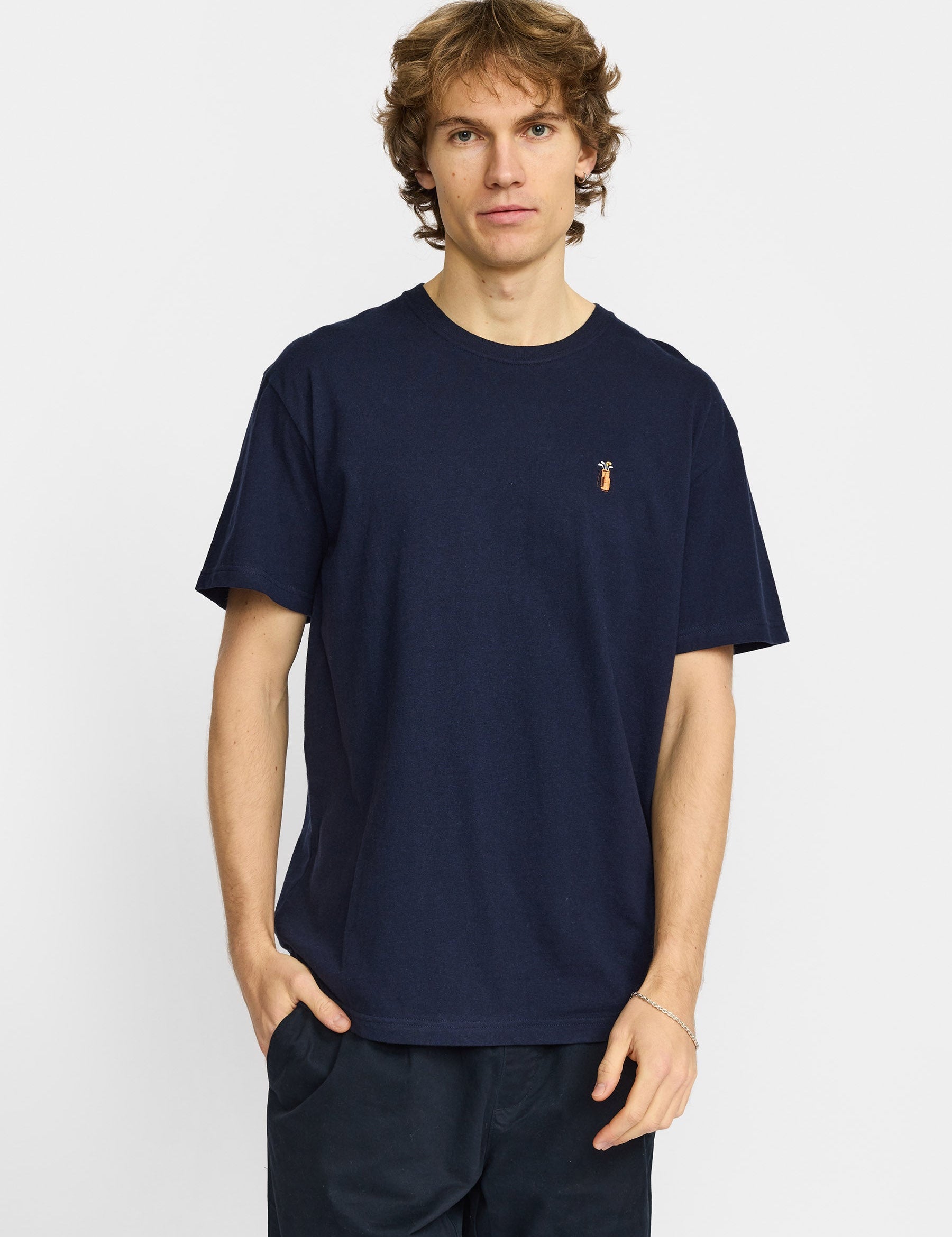 Camiseta REVOLUTION Application Golf Azul Marino Jaspeado, modelo frontal