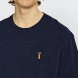 Camiseta REVOLUTION Application Golf Azul Marino Jaspeado, modelo pecho