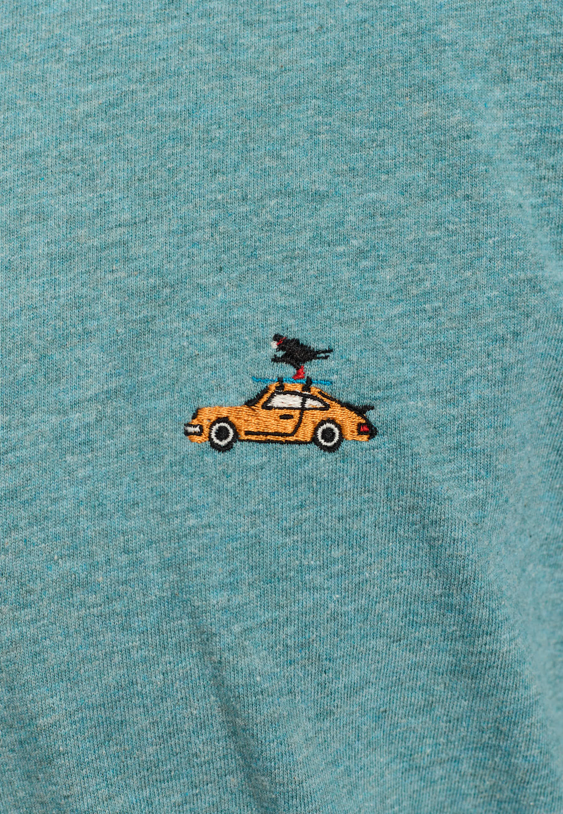 Camiseta REVOLUTION Application SKI Turquesa Jaspeado, detalle bordado
