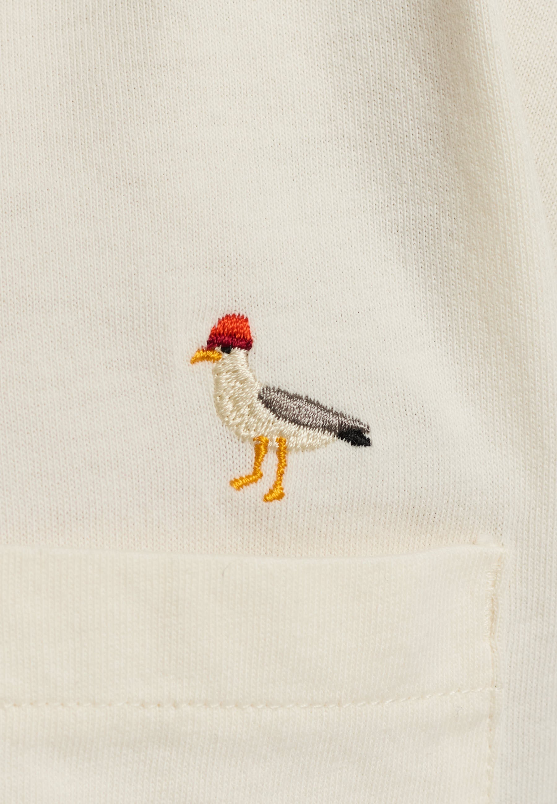 Camiseta REVOLUTION Application Seagull Blanco Roto, detalle bordado