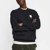 Sudadera REVOLUTION Coffee & Croissant Negro, modelo frontal