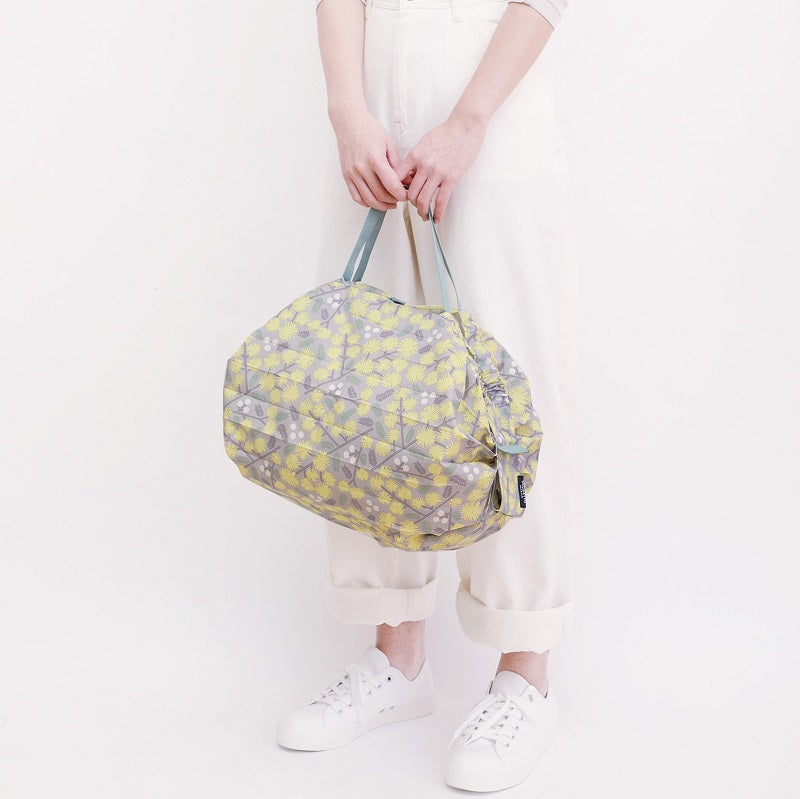 Bolsa SHUPATTO Compact M 15 L Mimosa, en modelo