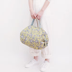Bolsa SHUPATTO Compact M 15 L Mimosa, en modelo
