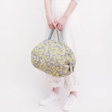 Bolsa SHUPATTO Compact M 15 L Mimosa, en modelo