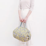 Bolsa SHUPATTO Compact M 15 L Mimosa, en modelo