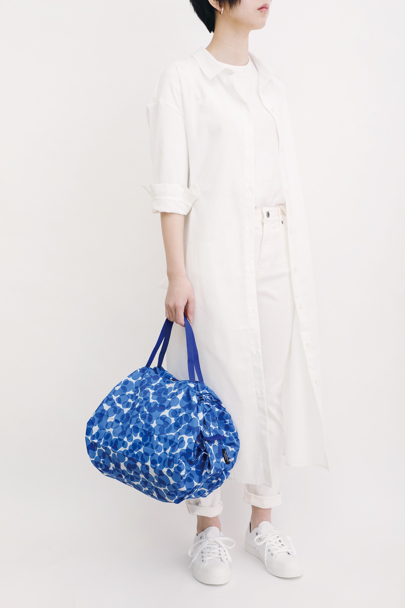 Bolsa SHUPATTO Compact M 15 L Ocean, en modelo