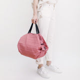Bolsa SHUPATTO Compact M 15 L Peach, en modelo