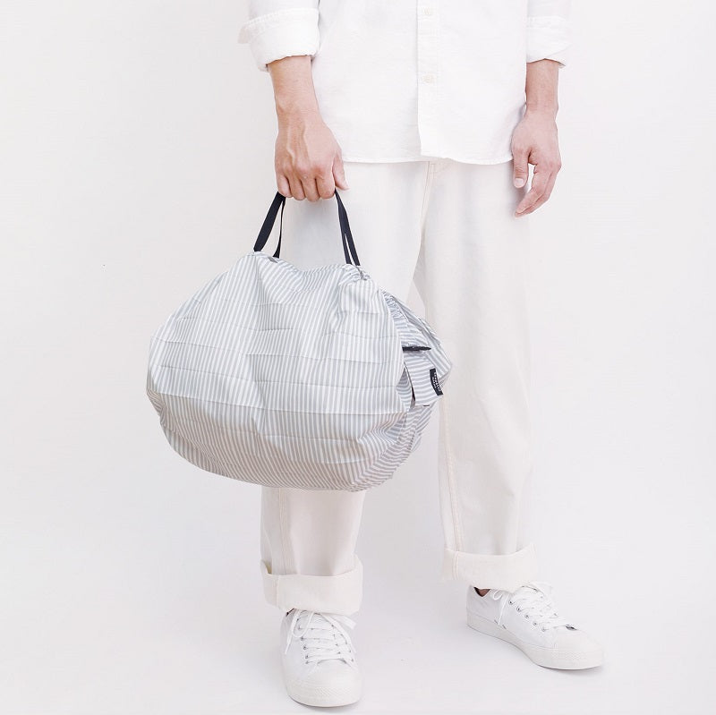 Bolsa SHUPATTO Compact M 15 L Stripe, en modelo