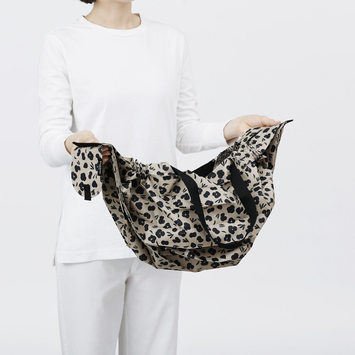 Bolsa SHUPATTO Compact L 40 L Paw Marks, plegada