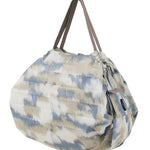 Bolsa SHUPATTO Compact M 15 L Floating Clouds, plegada