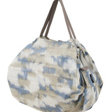 Bolsa SHUPATTO Compact M 15 L Floating Clouds, plegada