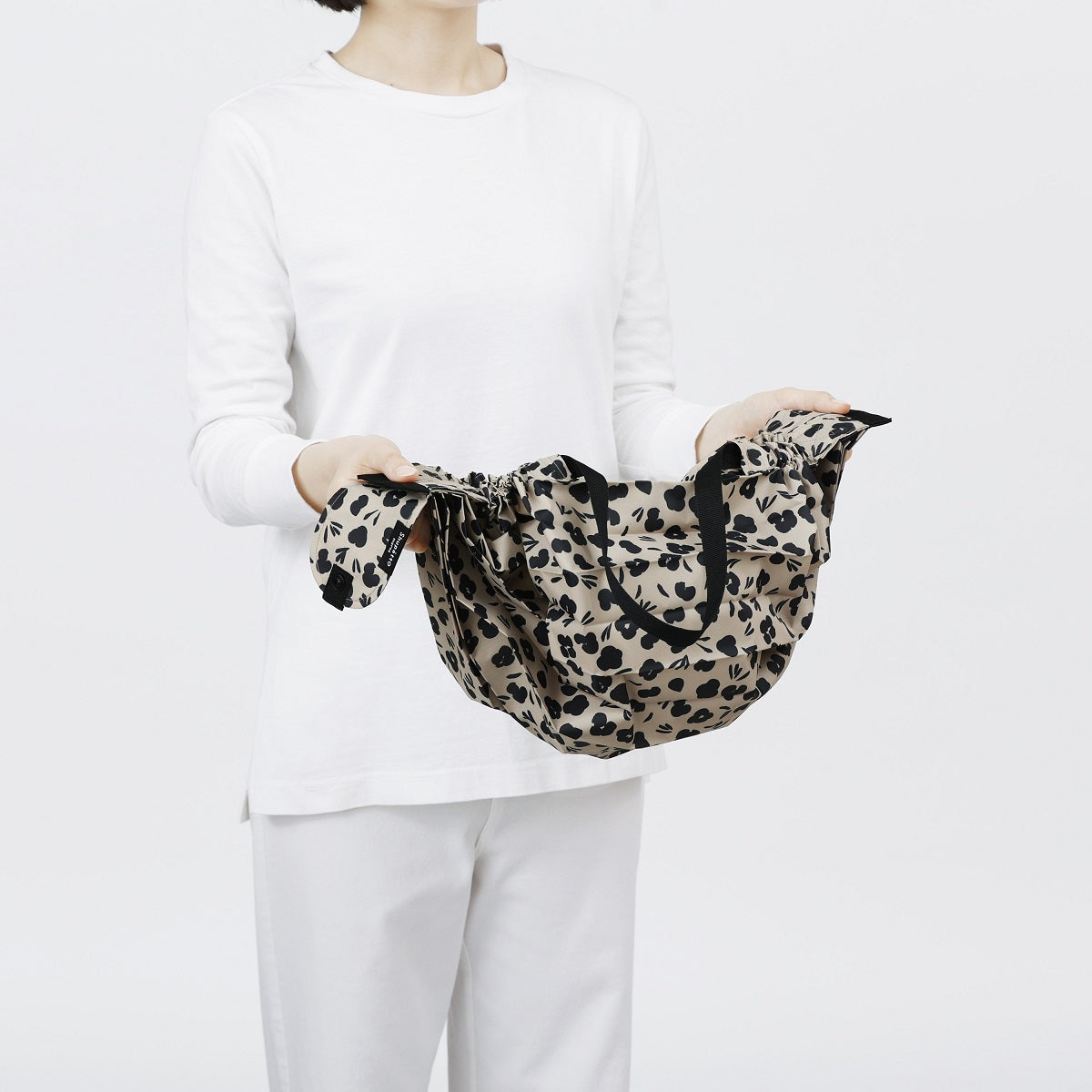Bolsa SHUPATTO Compact M 15 L Paw Marks, plegada