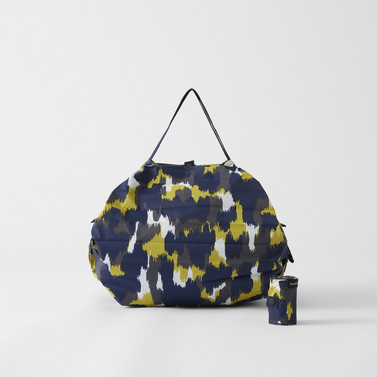 Bolsa SHUPATTO Compact M 15 L Shade of Trees, plegada