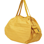 Bolsa SHUPATTO Compact L 40 L Mustard, vista frontal