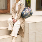 Bolsa SHUPATTO Recycled Compact M 15 L Ivy Leaves, en modelo