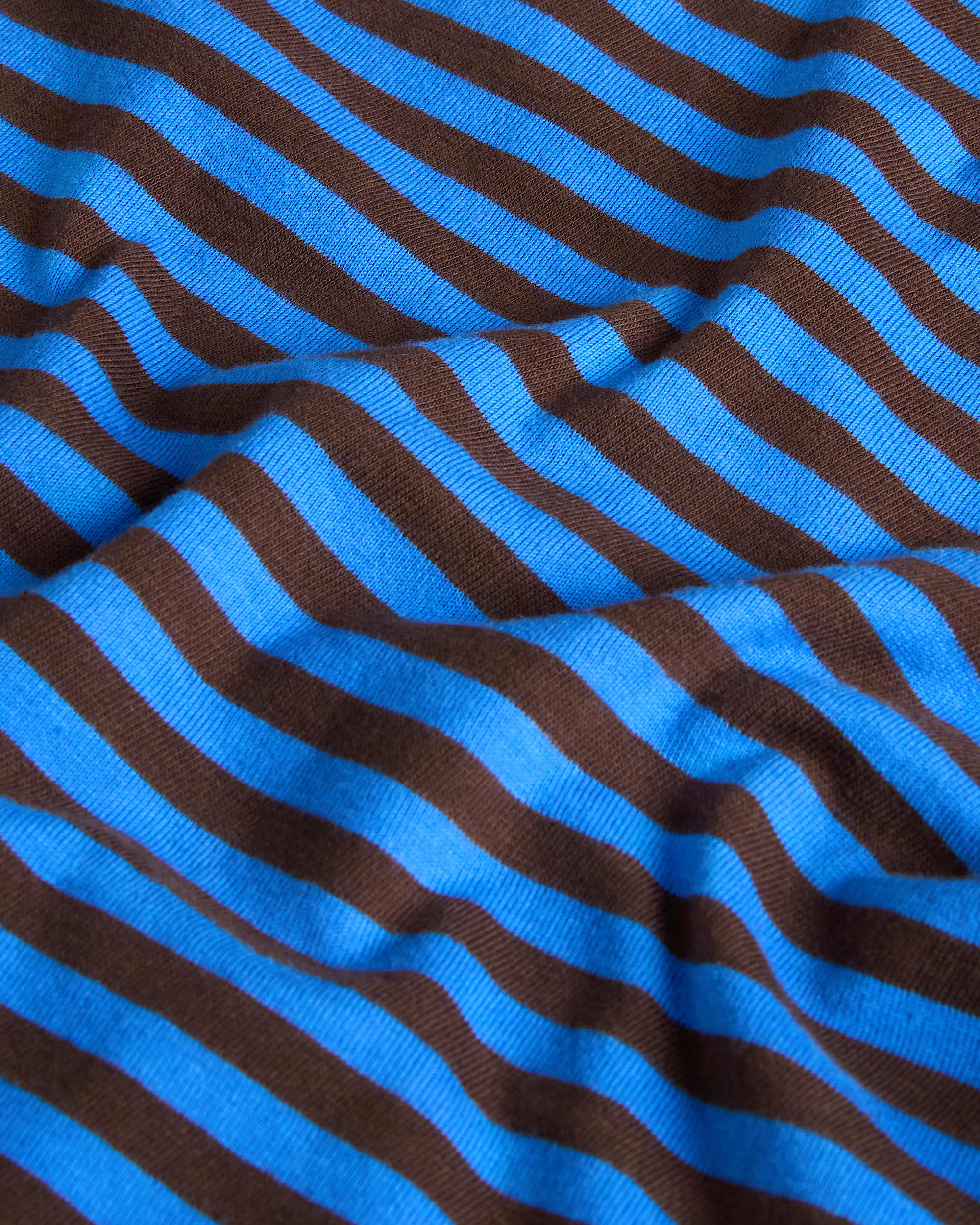 Detalle del tejido de la camiseta The North Face Vista Stripe Active Blue