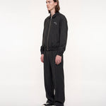 Pantalón WE ARE NOT FRIENDS Jimusho Tailored Negro, modelo lateral