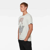 Camiseta RAW. Graphic - ECRU