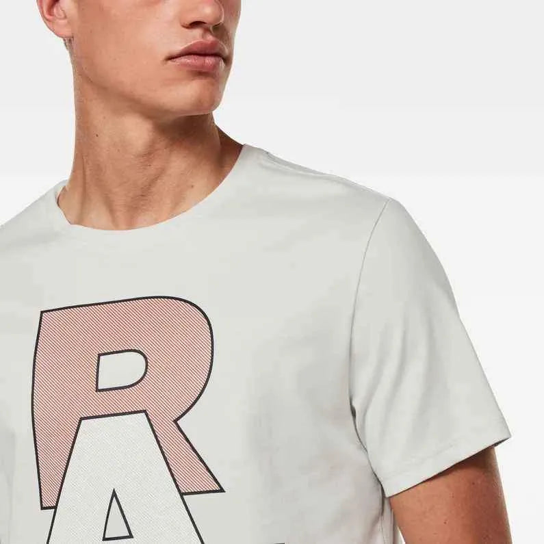 Camiseta RAW. Graphic - ECRU
