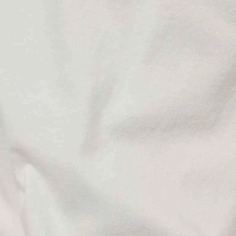 Camiseta RAW. Graphic - ECRU