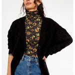 Cardigan de punto con botones y detalle de ochos negro - ECRU